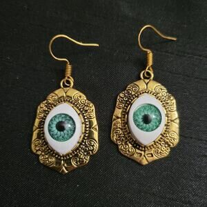 Creepy gothic eye cameo earrings